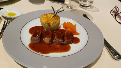 Roasted Beef Loin in Chianti wine sauce with pumpkin purée, black truffle and ricotta potato flan