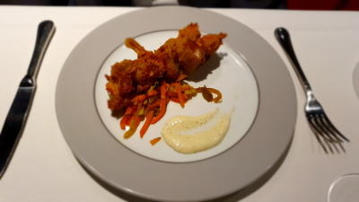 Unpeeled King Prawn and calamari skewer in panko & thyme coating, vegetable pavé and tartare sauce
